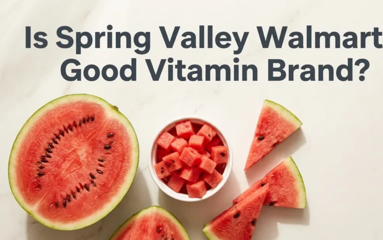 Overhead flat-lay photo of a halved red watermelon with diced cubes and wedges on a marble surface, with the title Does Watermelon Have Vitamin C overlaid.